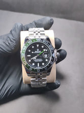 Rolex GMT-Master II “Green& Black Bezel”