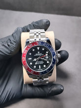 Rolex GMT-Master II “Red & Blue Bezel”