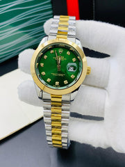 Rolex oyster perpetual two tone with Green dial and date