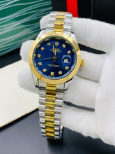 Rolex oyster perpetual two tone with Blue dial and date