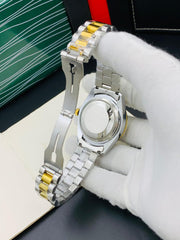 Rolex oyster perpetual two tone with White dial and date